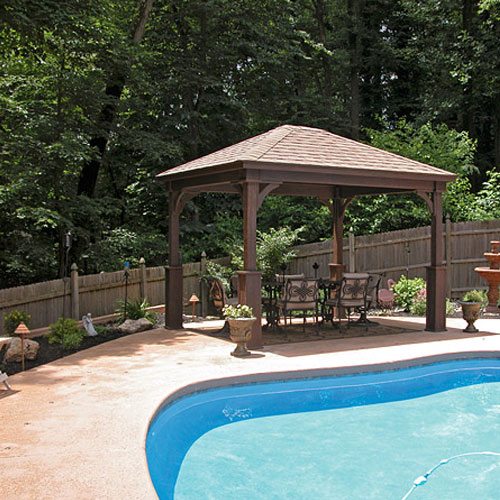 10 by 23 Traditional wood pavilion over a poolside sitting area. .