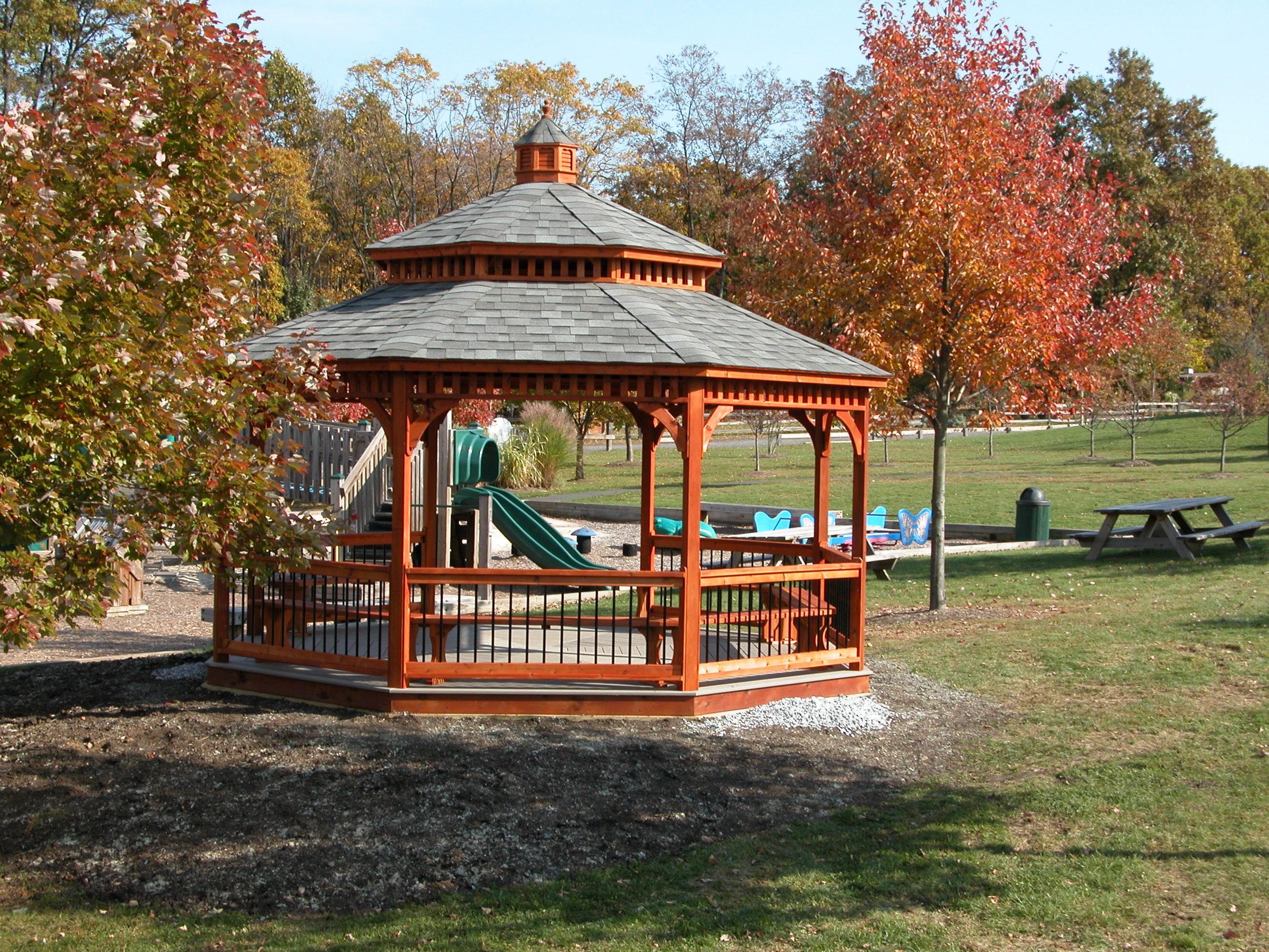 wood park gazebo with cedar stain